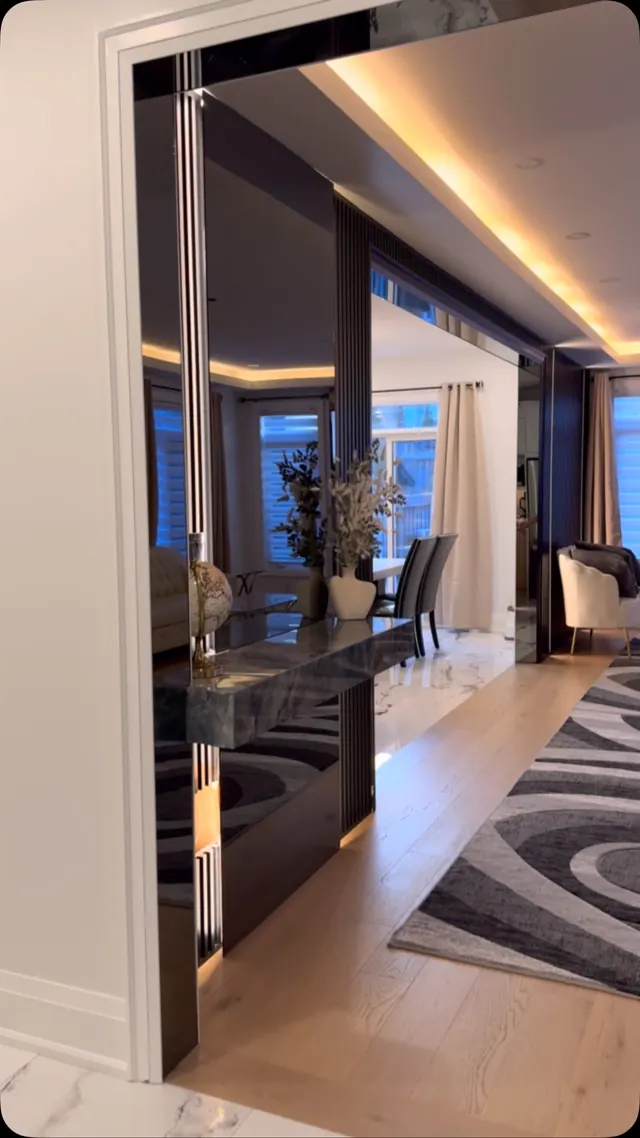Hallway with concealed cove lighting.